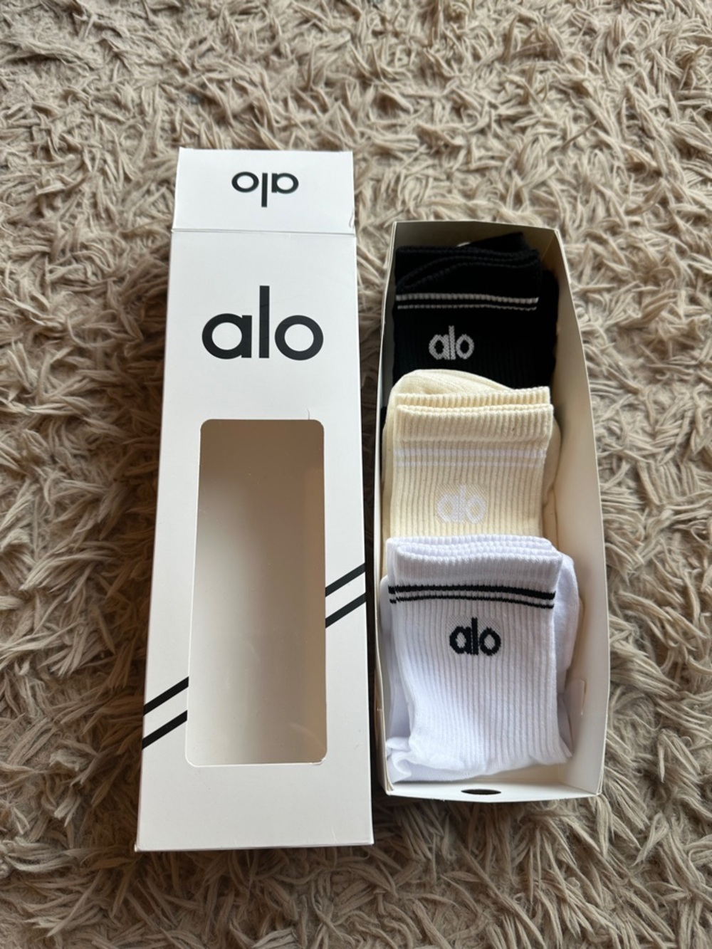 ALO Yoga White Half-Crew Socks with Vintage yellow, black and white Logo Stripe